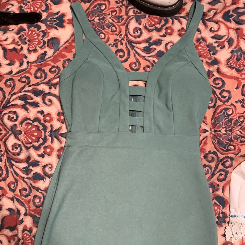 Beautiful greenish blue dress, bought for homecoming but it didn’t fit